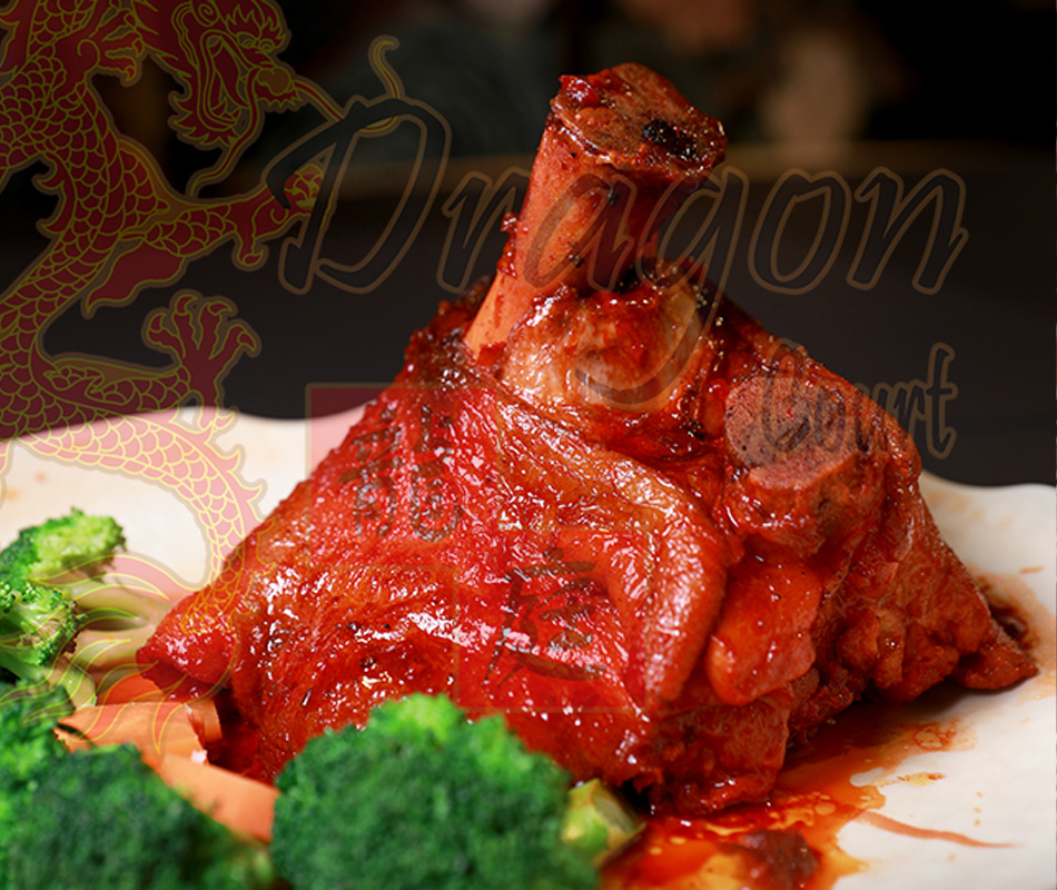 Dragon Court’s glazed German-style pork knuckle with broccoli